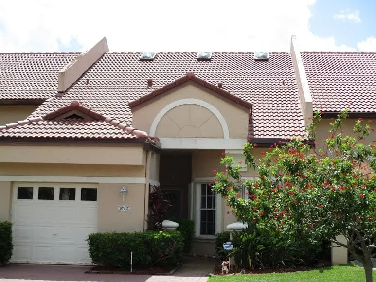 Slide of Heron Bay Roofing