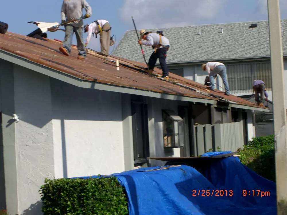 Slide of Heron Bay Roofing