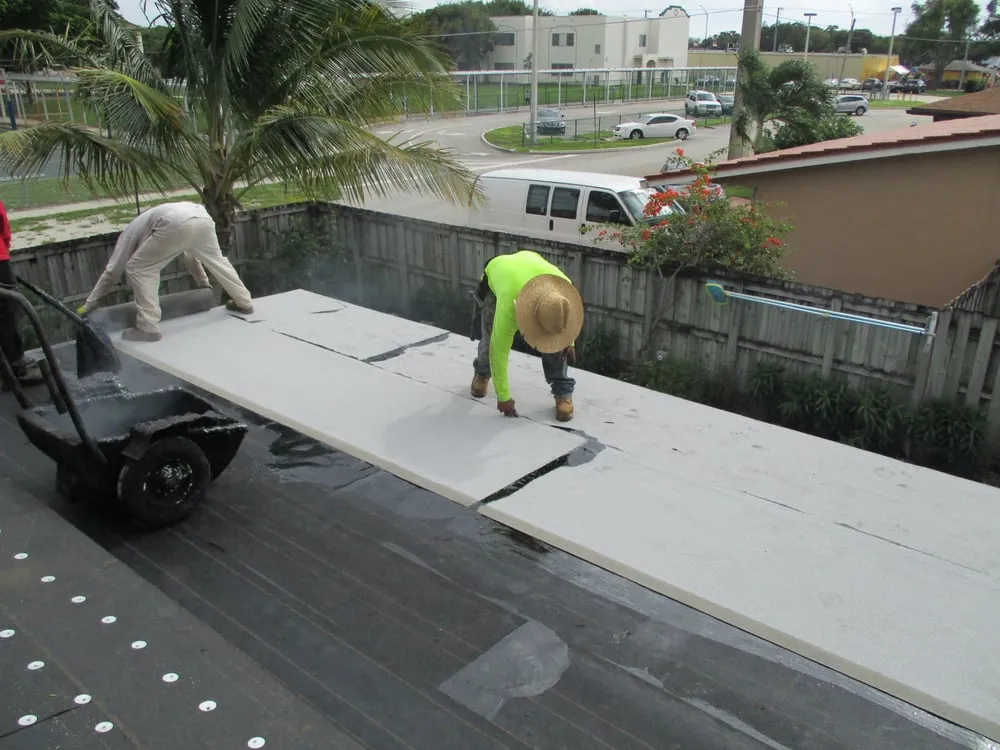 Slide of Heron Bay Roofing