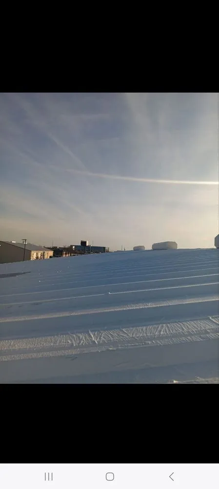 Slide of Herreras Roofing