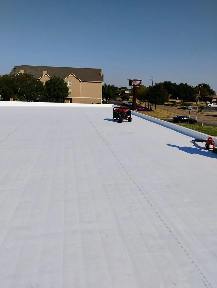 Slide of Herreras Roofing