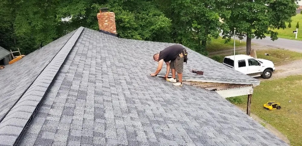 Slide of Herrings Roofing And Painting