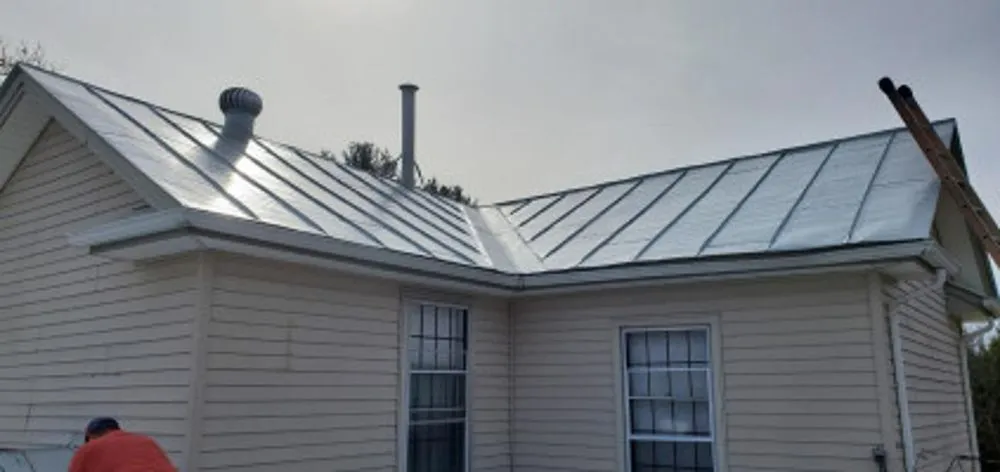 Slide of Herrings Roofing And Painting