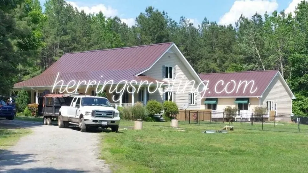 Slide of Herrings Roofing And Painting