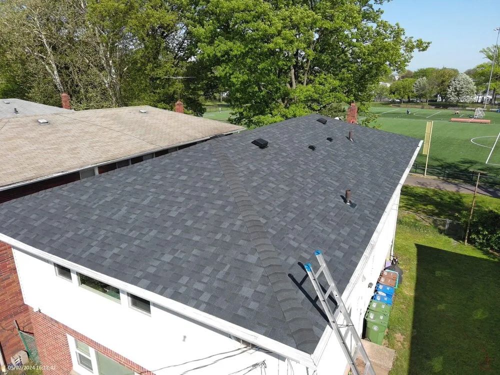 Slide of Herts Roofing & Construction