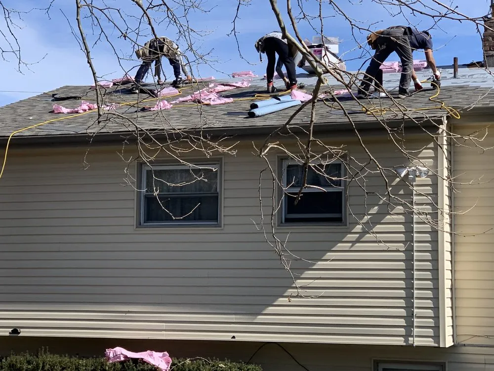 Slide of Herts Roofing & Construction
