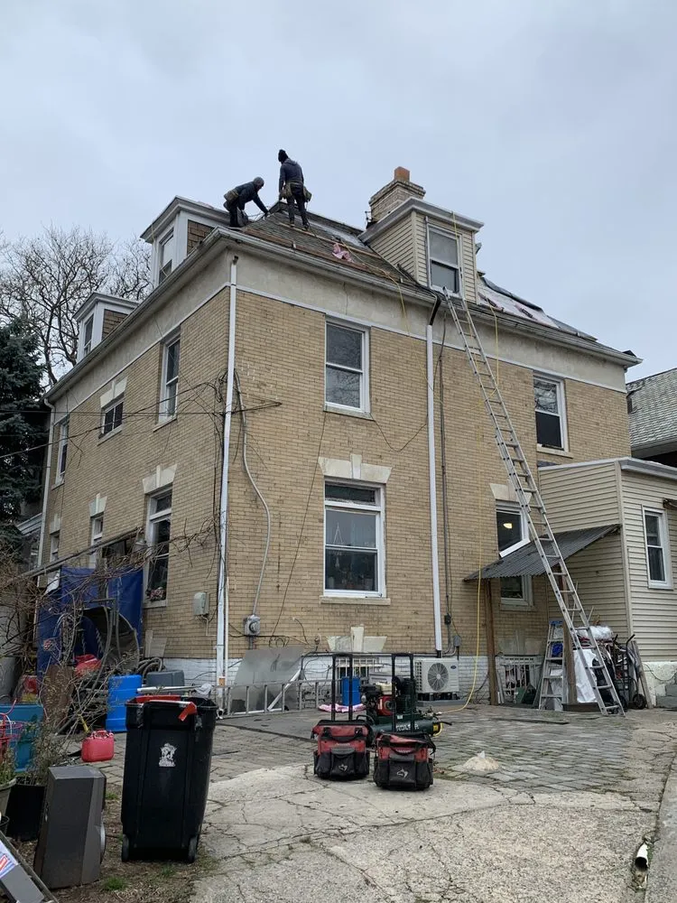 Slide of Herts Roofing & Construction