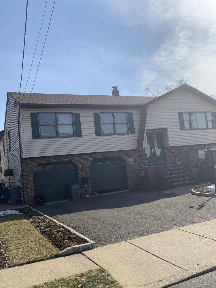 Slide of Herts Roofing & Construction