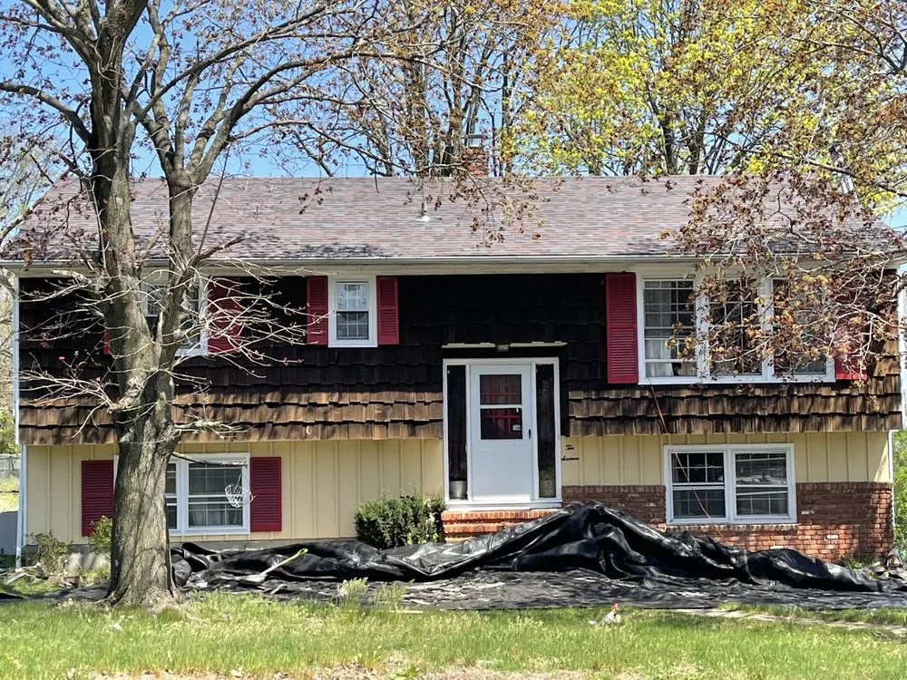 Slide of Herts Roofing & Construction