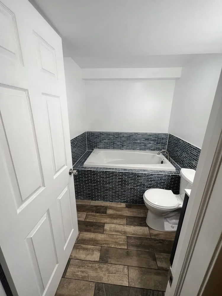 Slide of Hetrick Roofing and Construction