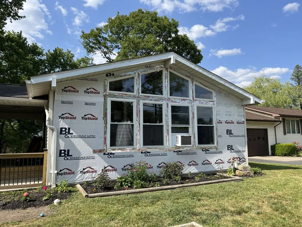 Slide of Hetrick Roofing and Construction