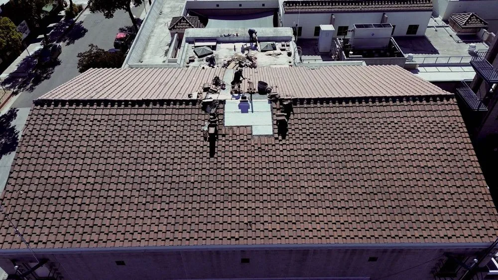 Slide of Hexagon Commercial Roofing