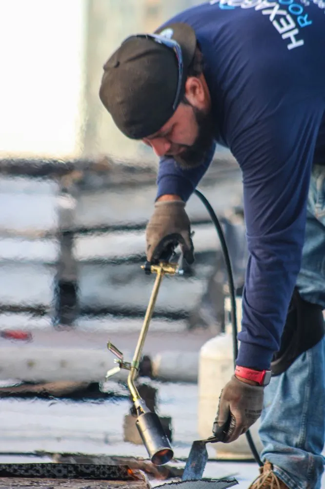Slide of Hexagon Roofing Inc.