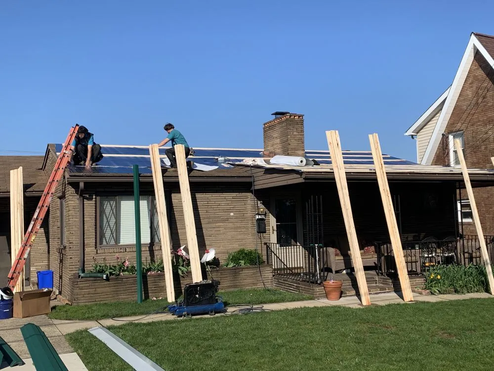 Slide of HHI Roofing