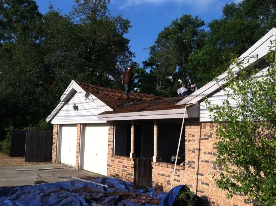 Trusted storm damage roof repair in New Caney, TX by Hi-Tech Roofing & Home Services