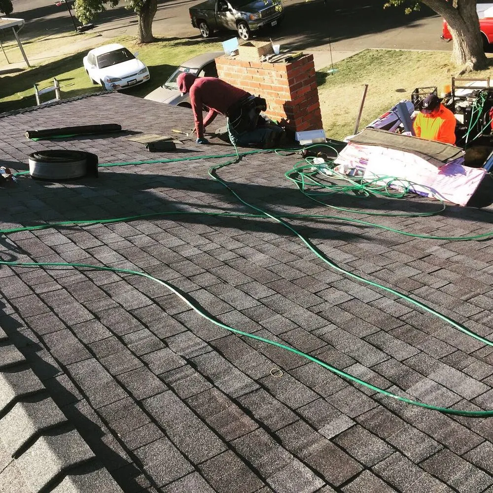 Slide of Hi-Tech Roofing Services