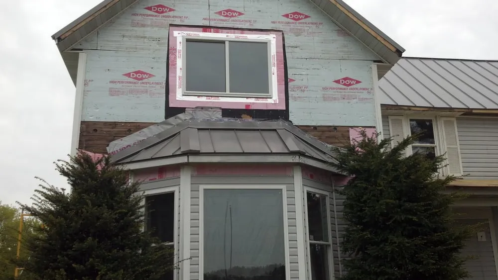 Slide of Hickey Roofing