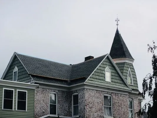 Hickory Roofing & Construction Logo