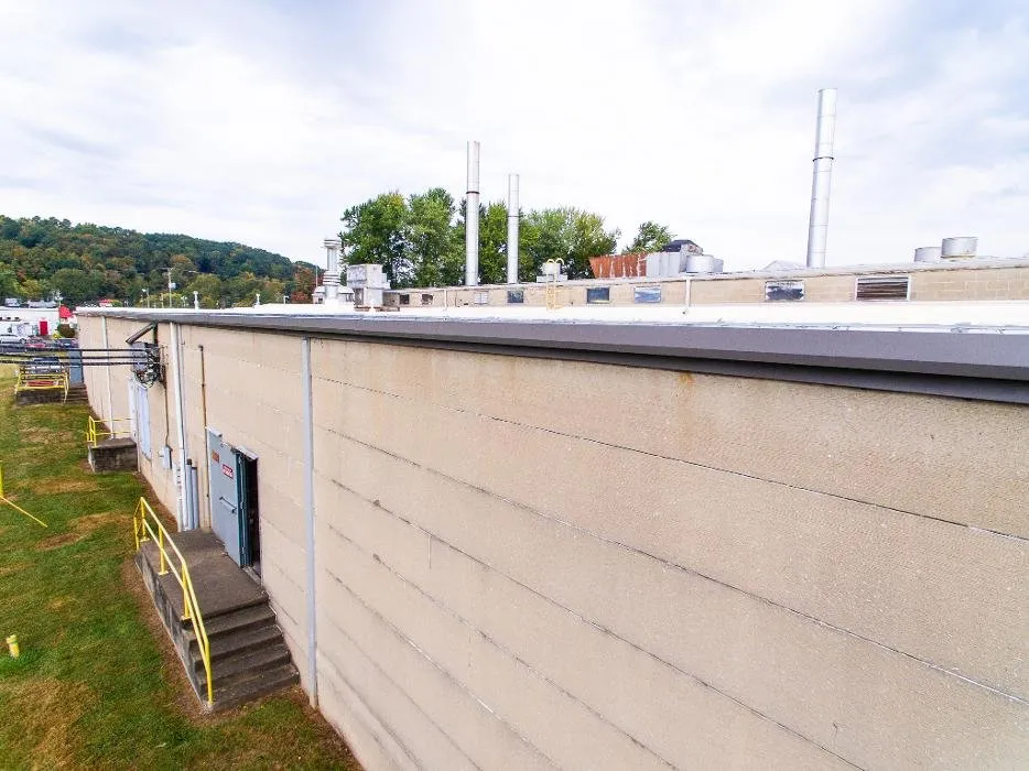 Slide of Hicks Industrial Roofing