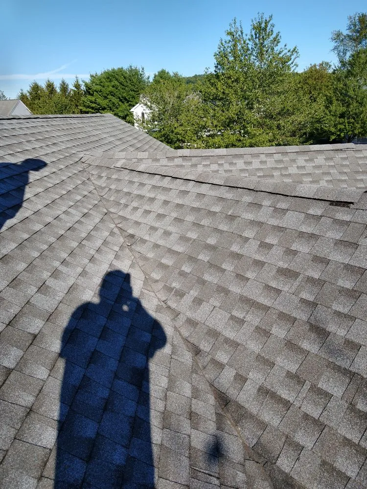 Slide of Hiesters Roofing