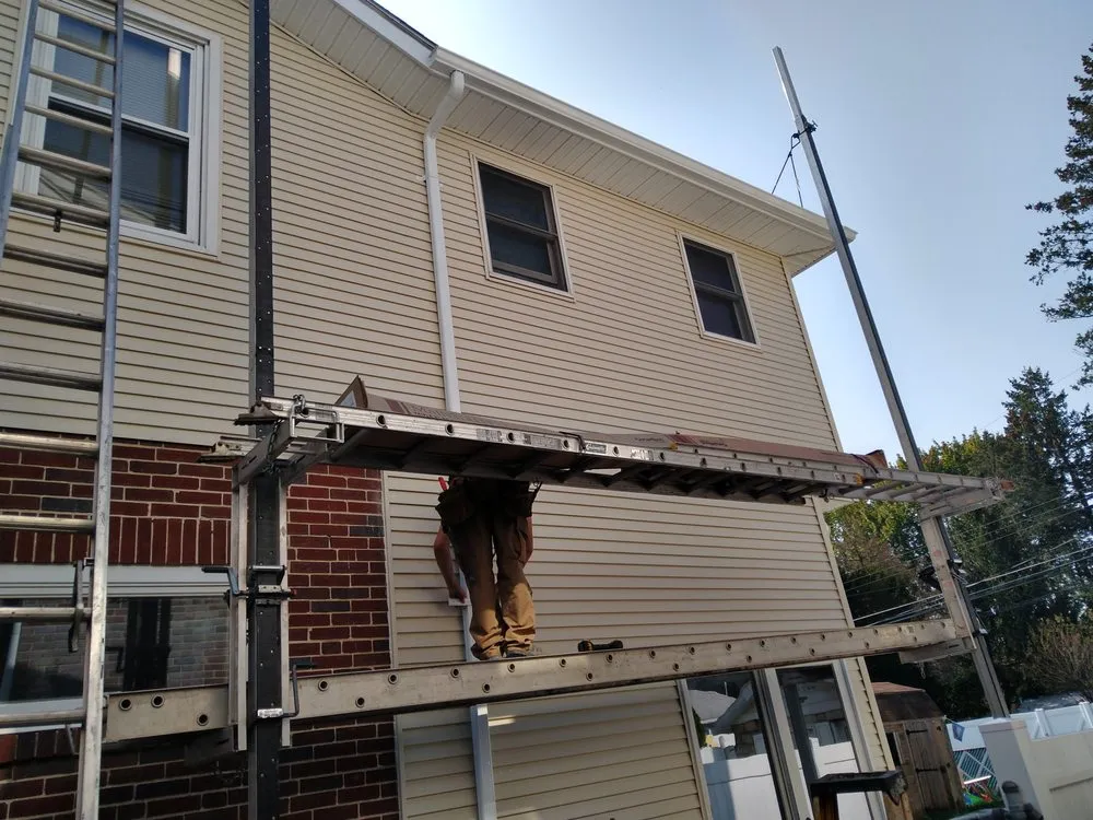 Slide of Hiesters Roofing