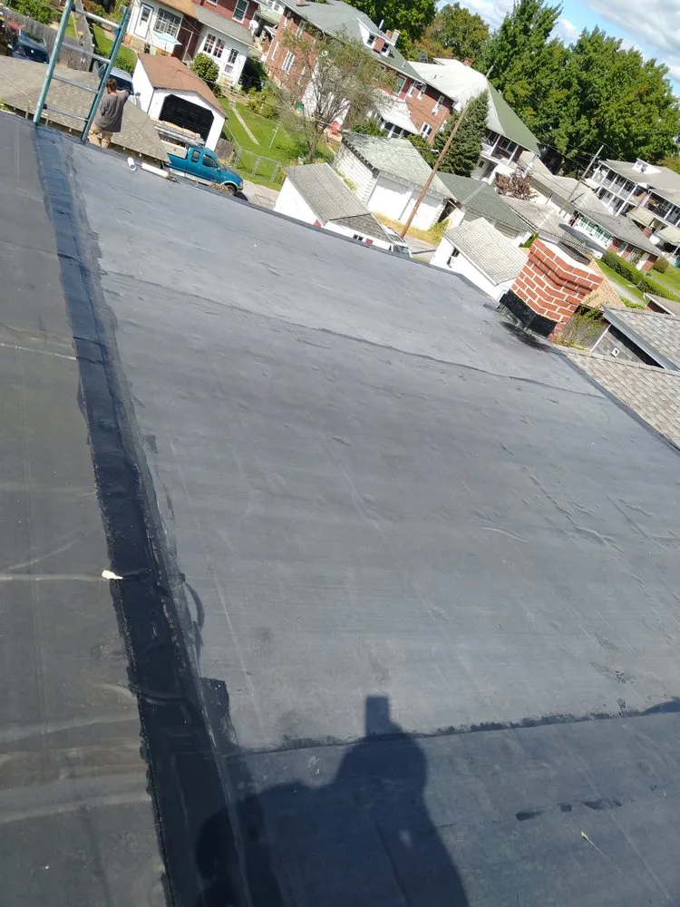 Slide of Hiesters Roofing