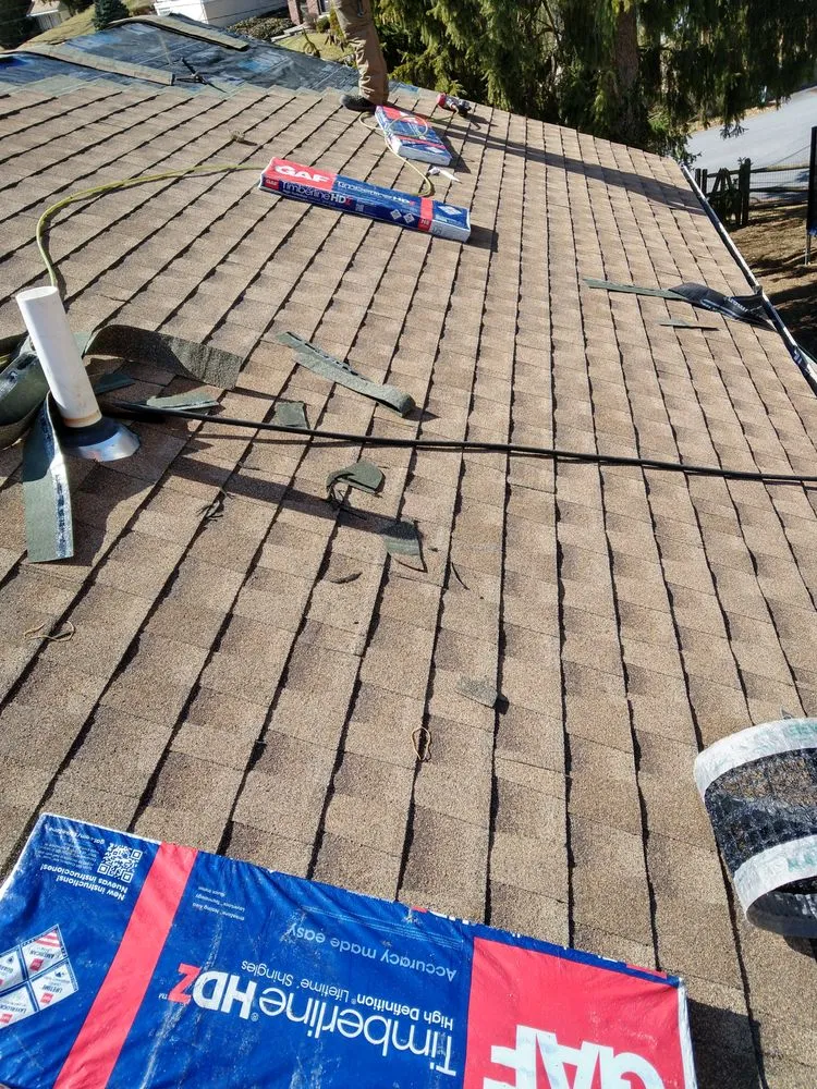 Slide of Hiesters Roofing