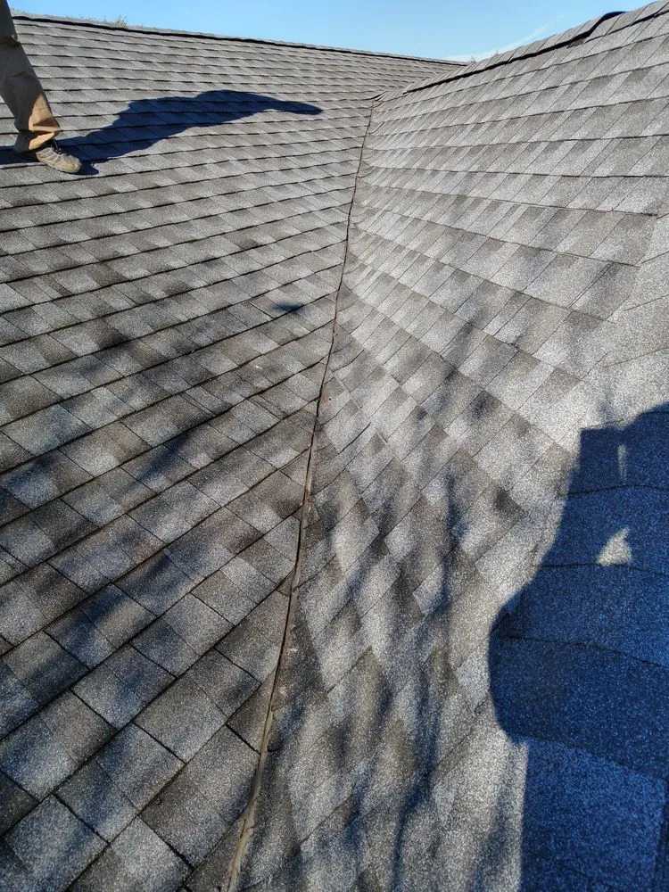 Slide of Hiesters Roofing