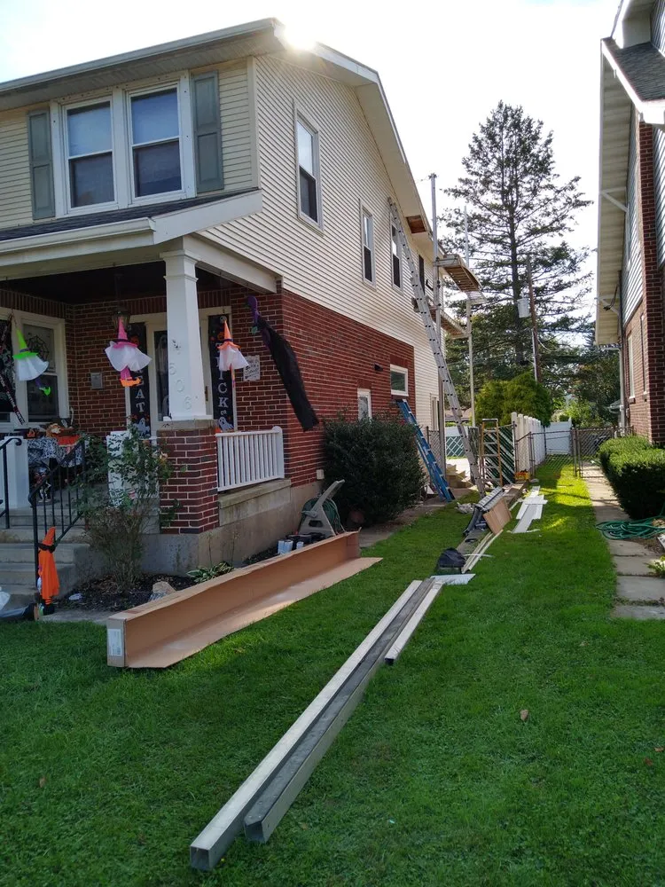 Slide of Hiesters Roofing