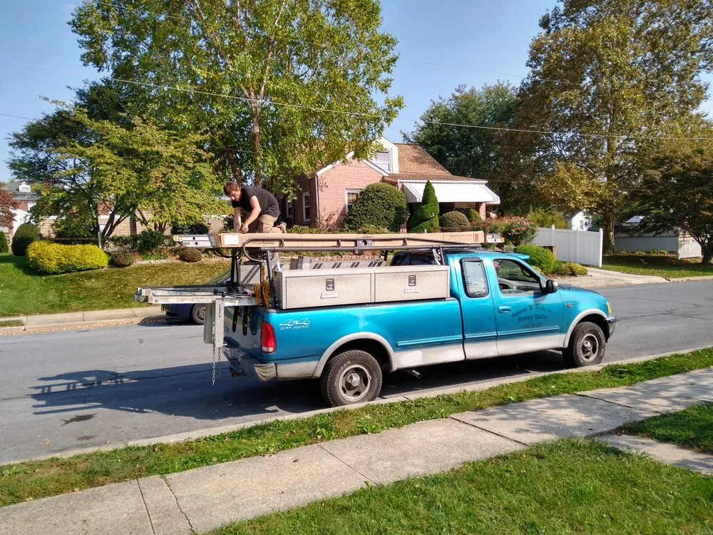 Slide of Hiesters Roofing