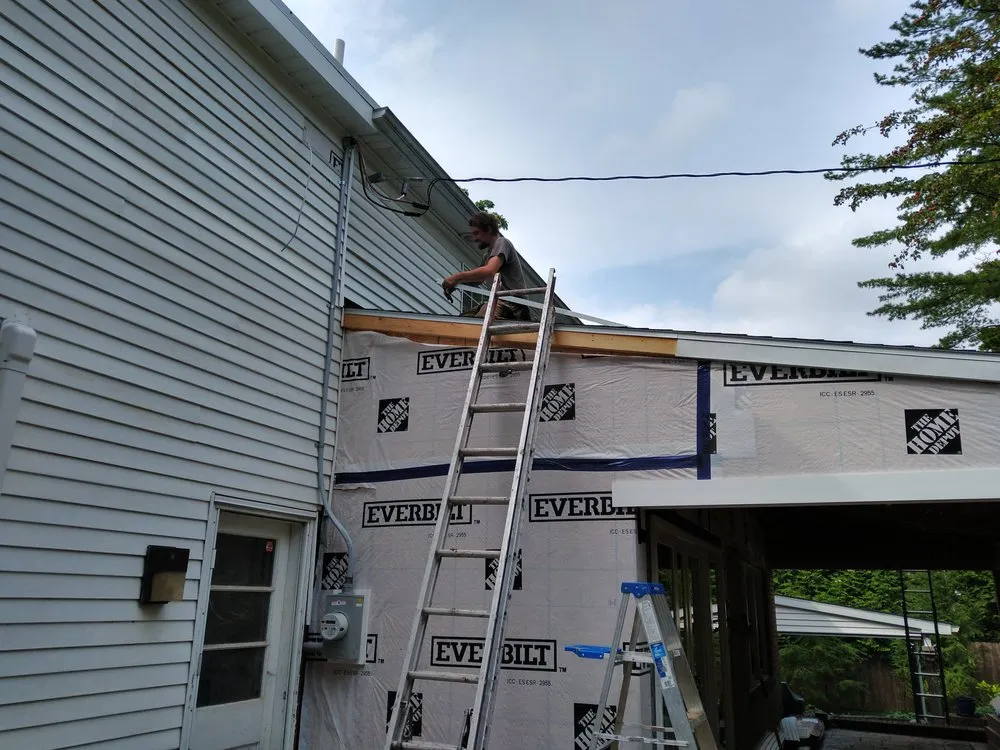 Slide of Hiesters Roofing