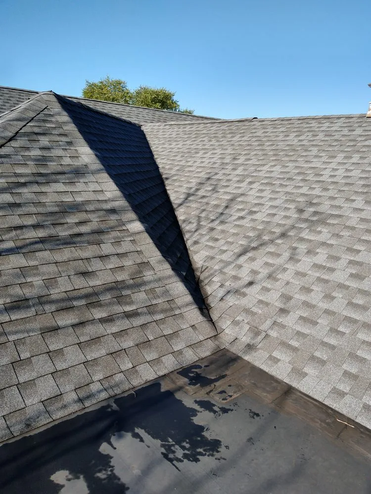 Slide of Hiesters Roofing