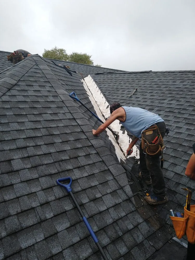 Slide of Hiesters Roofing