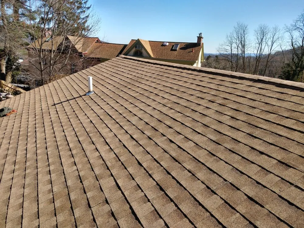 Slide of Hiesters Roofing