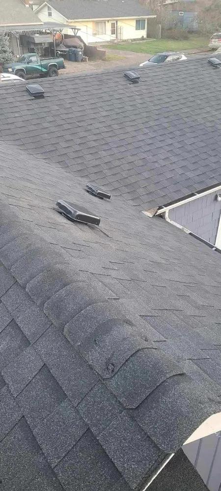 Slide of High & Dry Roofing