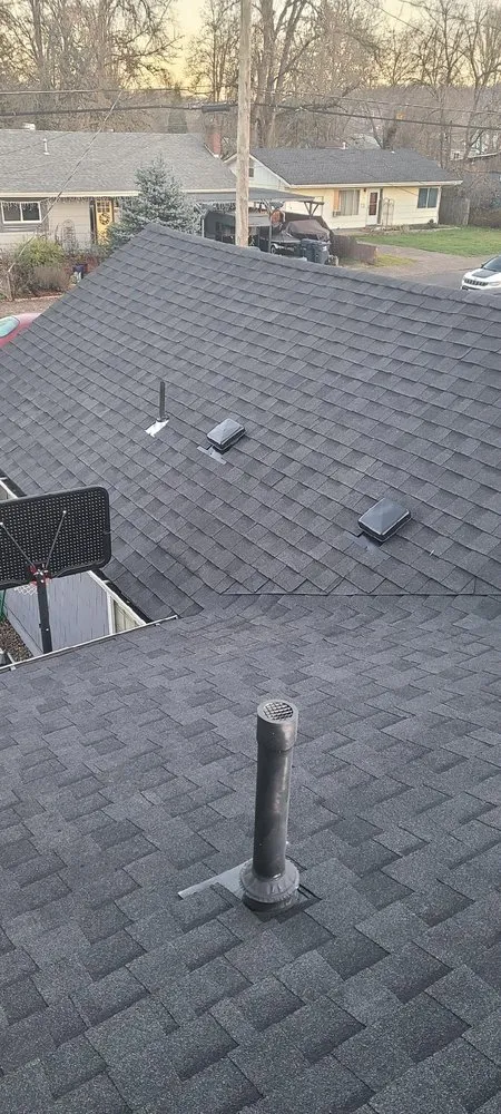 Slide of High & Dry Roofing