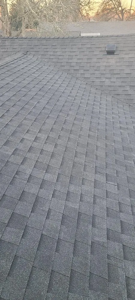 Slide of High & Dry Roofing