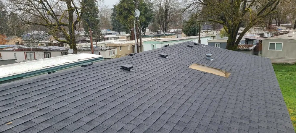 Slide of High & Dry Roofing