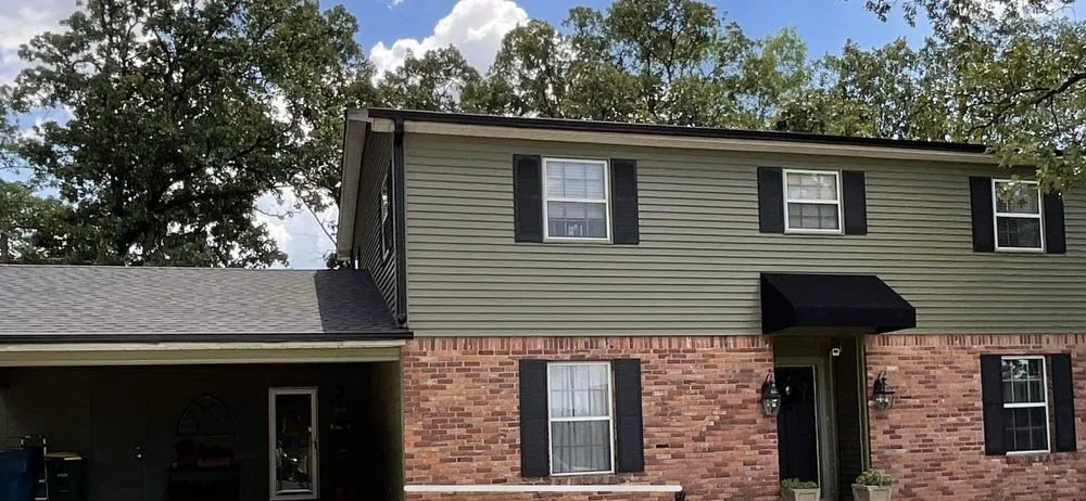 Slide of High Caliber Exteriors