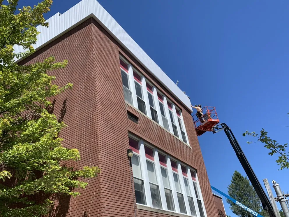 Slide of High Caliber Roofing