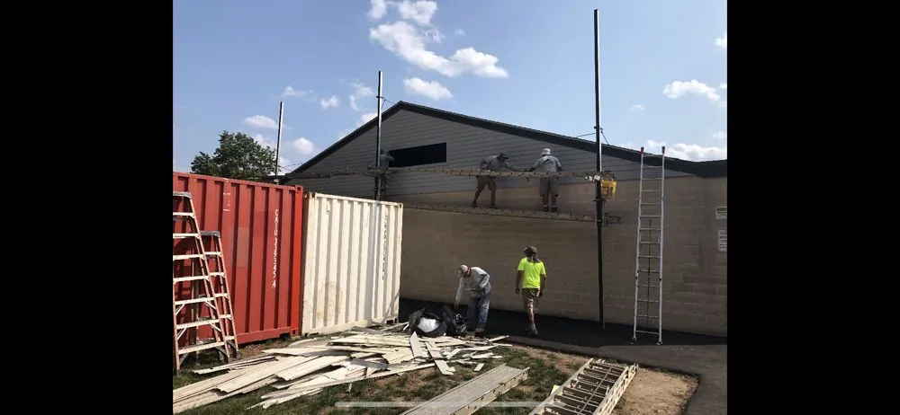 Slide of High Caliber Roofing