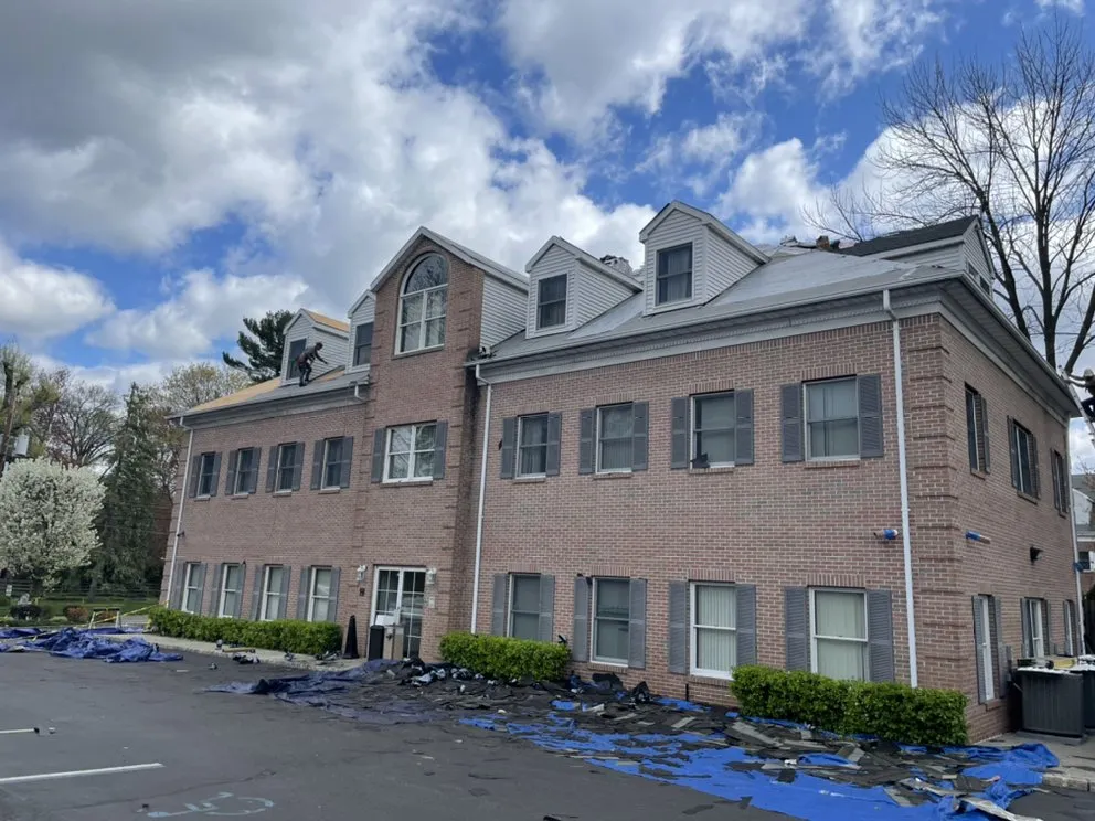 Slide of High Caliber Roofing