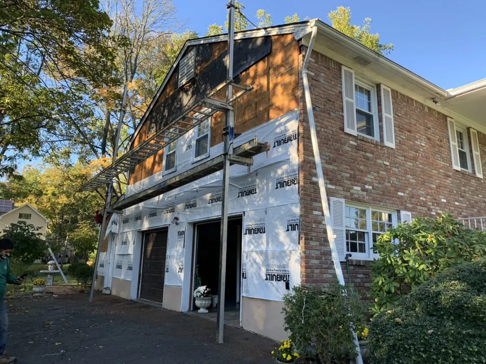 Slide of High Caliber Roofing