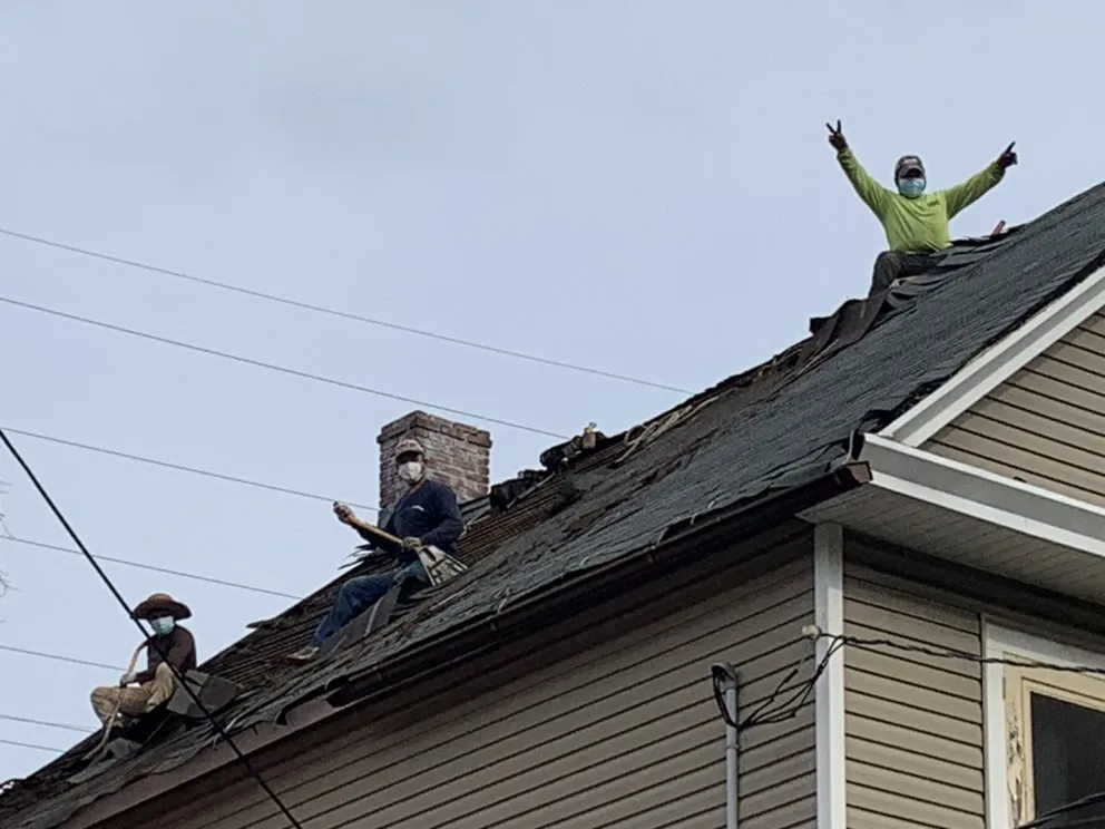 Slide of High Caliber Roofing
