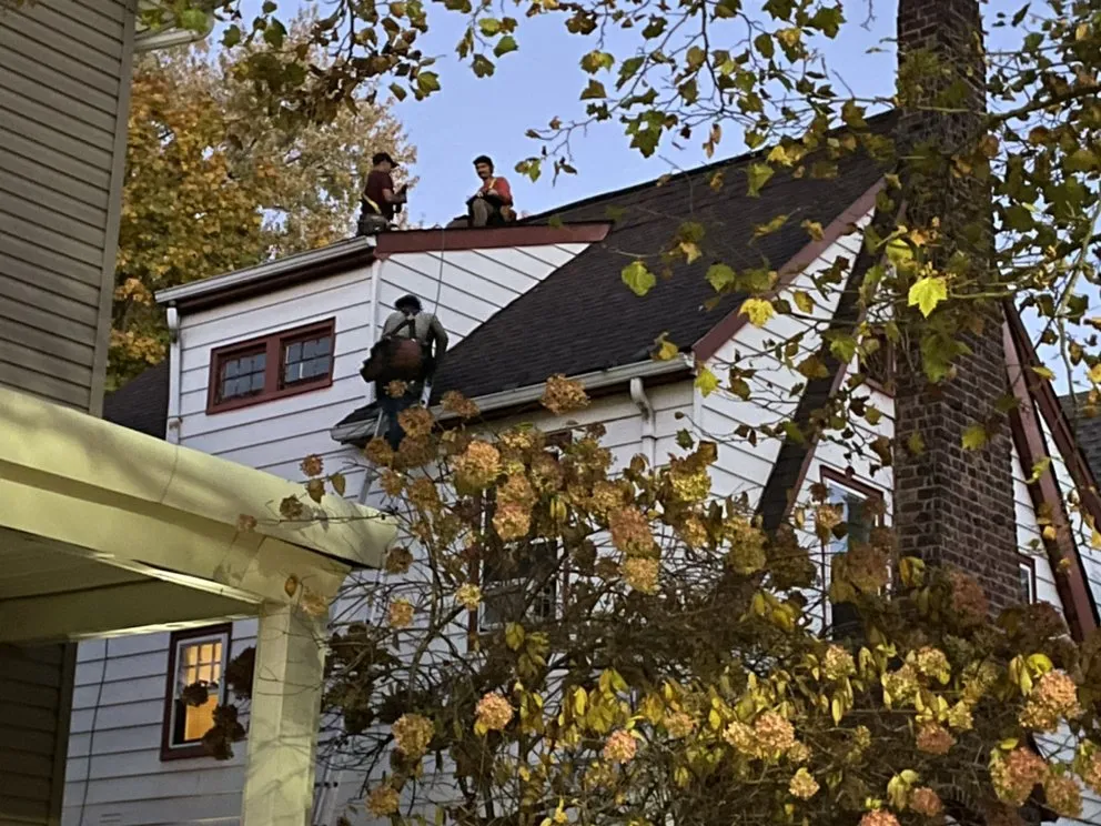 Slide of High Caliber Roofing