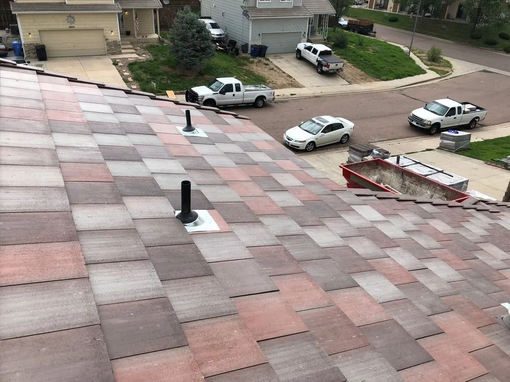 Slide of High Pride Roofing