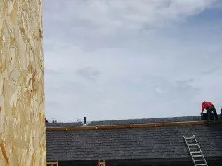 Slide of High Profile Roofing