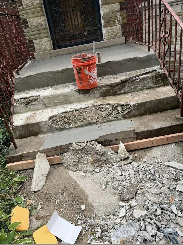 Local storm damage roof repair in Flushing, NY by High Ridge Roofing And Masonry