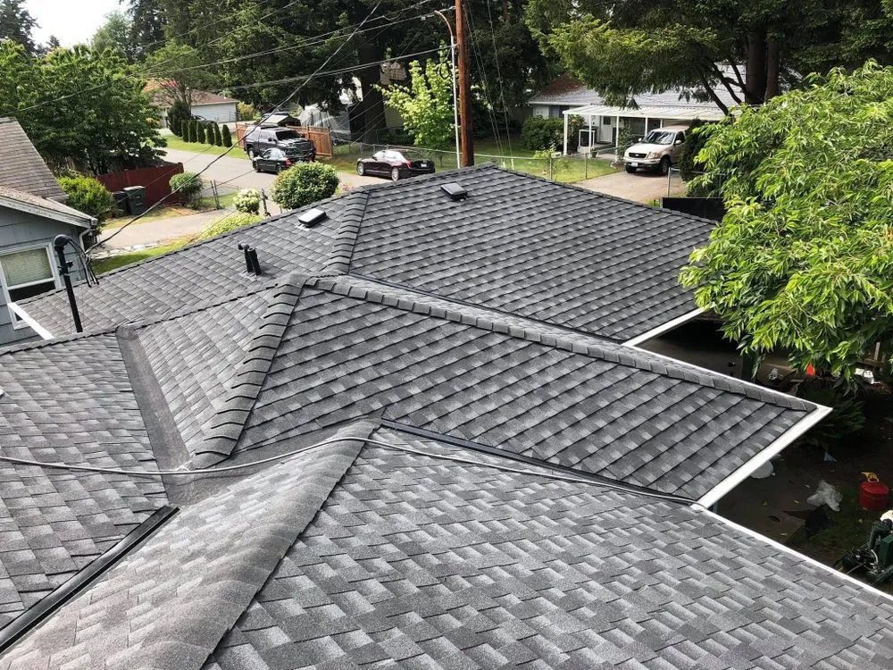 Slide of High Standards Roofing