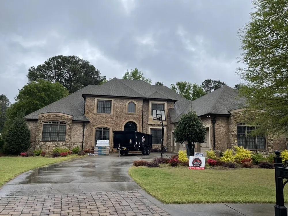 Slide of Hill Top Roofing